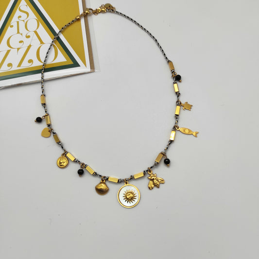 Collana corda e charms